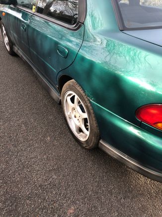 Surface rust above rear passenger's side arch