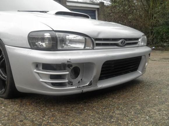 When i brought it. You carnt see much on the pic but the driverside wing was smashed in he bumper was damaged and the bonnet was all rippled.