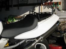 mono seat with integrated cargo rack