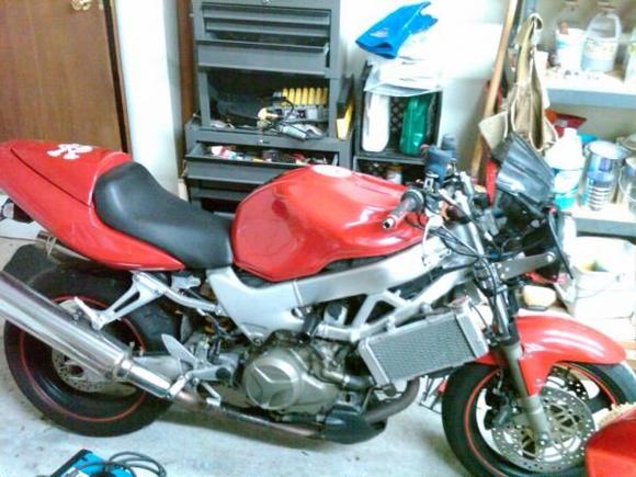 Added Pro-Taper handlebars with Pro-Taper handlebar risers so the bike would be the same distance from the ground in front. Didn't want to raise the front. The Pro-Taper bars are the over sized model, basically thicker wall so if the bike falls over, the bars won't bend.
