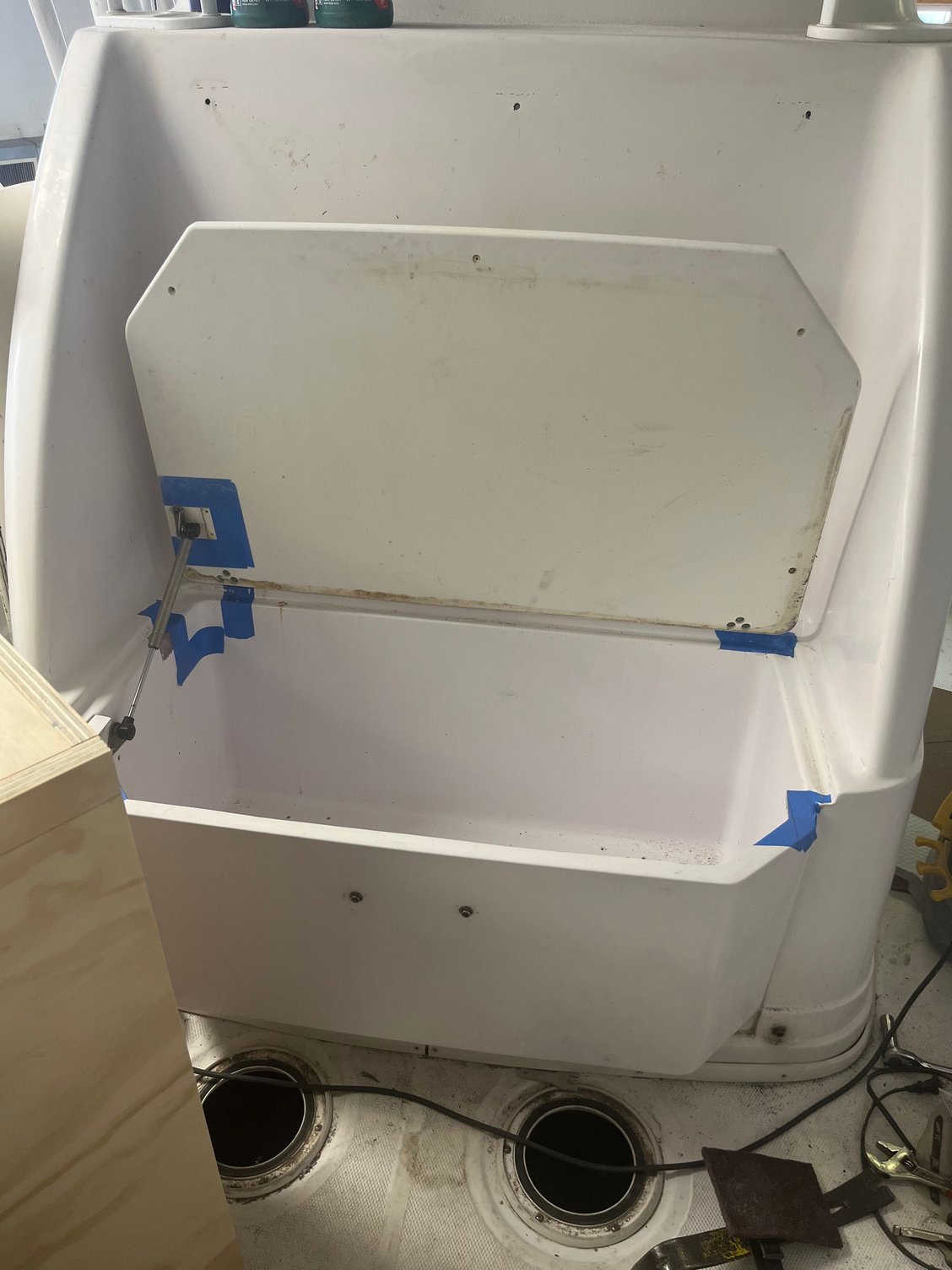 Cooler area under seat front of console 