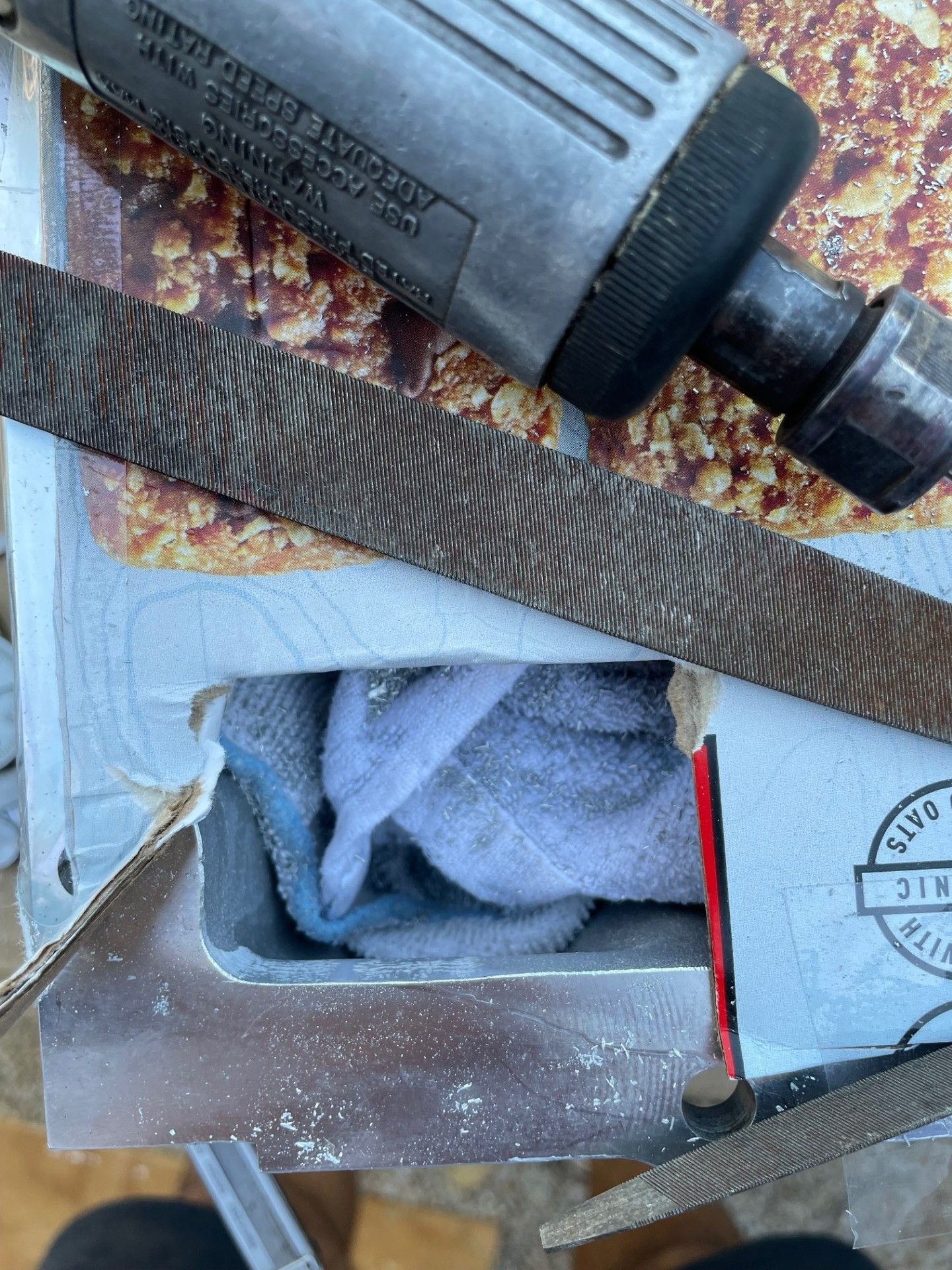 I cleaned up the rough, burr marks with a file.