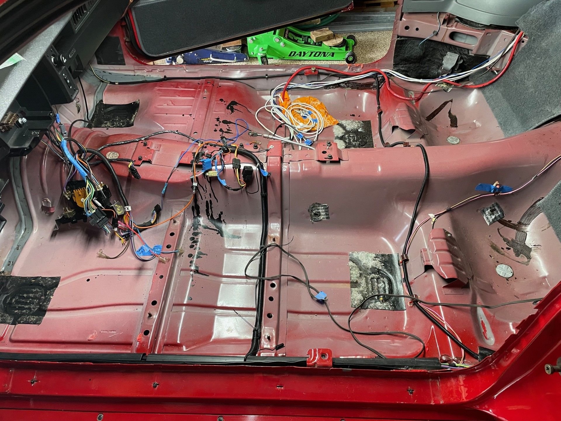 You can see the white RCA cables, just below the green jack, for the power amplifier mounted in the back.  While this interior is out, Im going to run the wires for a Kenwood backup camera for my Kenwood DMX958XR head unit.