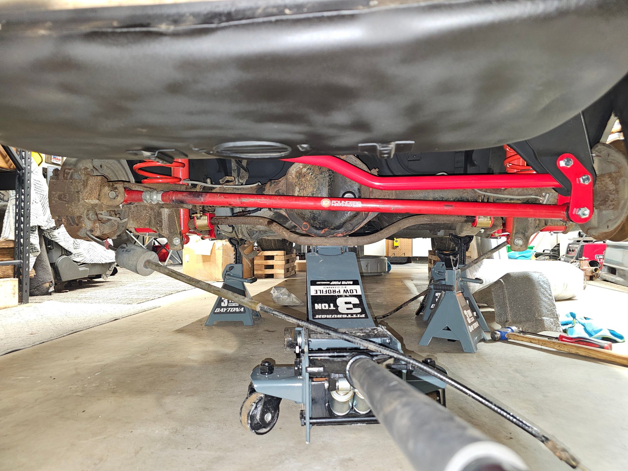 Founders adjustable panhard bar, UMI performance lower control arms, upper panhard bar, Eibach sportline springs, and energy suspension bushings on the stock rear sway bar. 