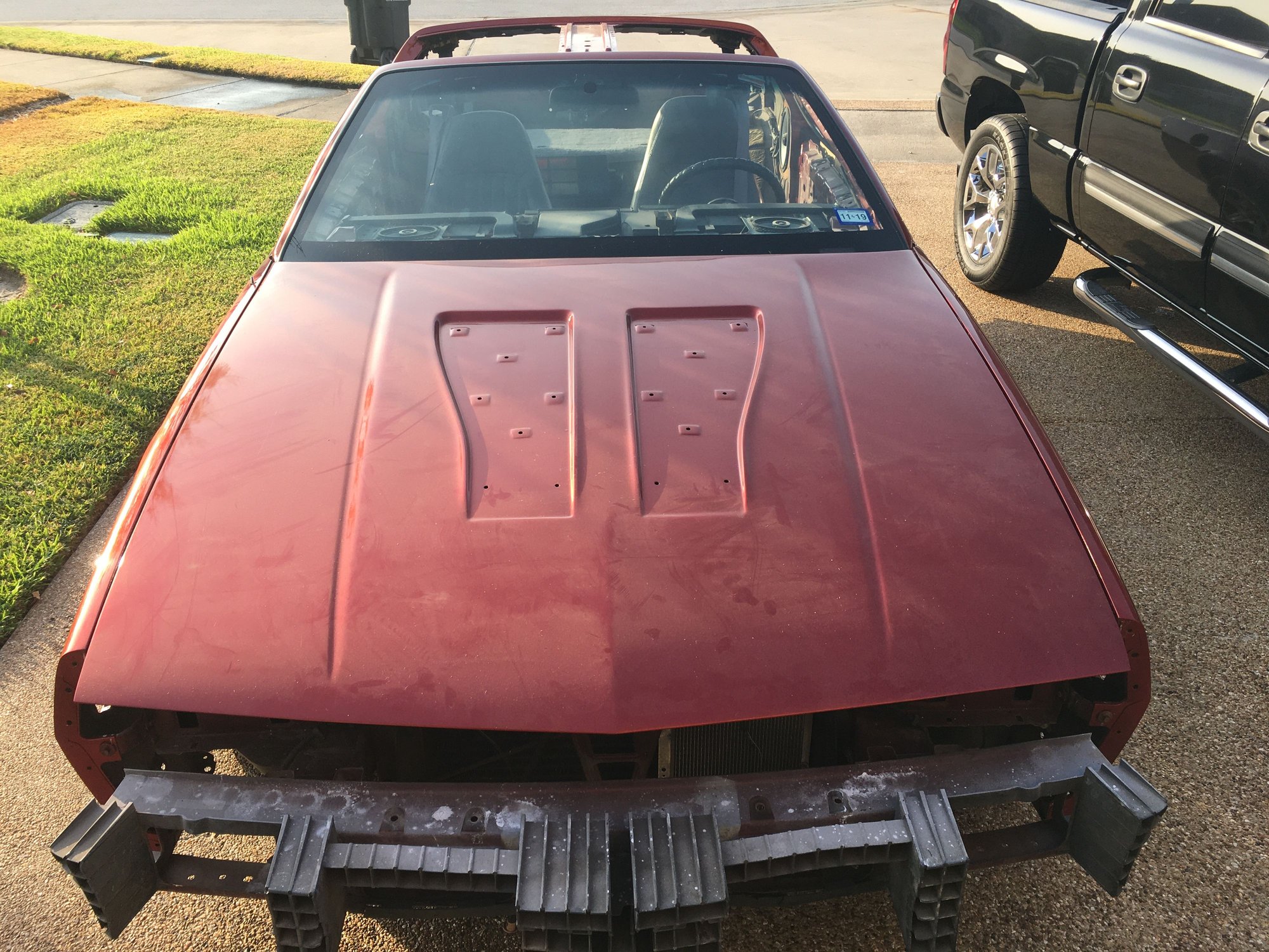 Bad body work and the paint is the wrong tone. Lack of coverage made it very brassy. 