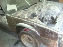 Starting to strip the surface rust on the fender.