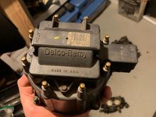 Replacement hei distributor cap with original coil cap and autozone replacement coil. The distributor cap has black over spray on it and some oxidization on the contact points inside the cap. The coil alone was around $25. I’ll do the whole thing for $40 shipped