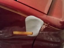 Passenger side fender dent