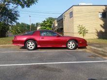 Greensboro, NC. This ones been in this parking spot for many years. It looks too good to be forgotten but I dont recall seeing it ever being out of this space. It has a sun visor thats fallen down. I think that dark red looks fabulous on our cars.