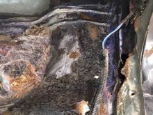 Front passenger floor damage 