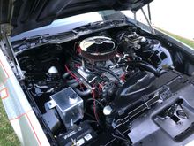 Fresh engine bay in gloss black with the 400 SBC