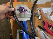This Amazon, china hydraulic crimp tool got great reviews.  It was about $125 when I purchased it in the fall of 2023.  It did a great job on the Mustang and I plan to use it again on my next project car.