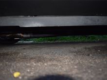 Side shot of exhaust. U can see the Asa's collectors in the left. They are the lowest part of the whole exhaust and everything tucked up higher than stock. This is with a driveshaft safety loop.