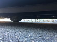 Front of car SS header collectors on left tranny pan hangs 1/2" or so below the exhaust collectors.