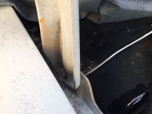 Passenger side hood hinge.