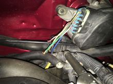 The valve hidden behind the wiper motor. I will further hide it with conduit in the wiper motor wires.