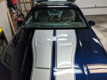 New paint, silver racing stripes. 5 stages of clear coat sanding and three stages of polishing.