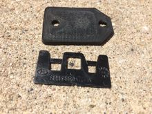 Top is rubber behind silver wedge. Note that the shim screw holes are closer together than the gasket holes.