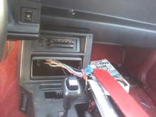 The radio was ripped out along with all of the speakers the wires were all chopped when i got the car