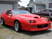 1988 Iroc has a 350 motor and 425 hp.
with 650 edelbrock intake and carb.
crane cam , 202 valves , ported polished 4 barrel heads
headman headers and flowmaster exhaust.
350 turbo trani and has a stage 2 shift kit ( B &amp; M slapshift )
has new low profile tires ( Yokahama A520 tires )
17&quot; tires 285 in the rear and 255 on the front.
mounted to american racing rims.
pioneer am/fm cd player with detachable face plate.
8&quot; mitek in rear and pioneer 4&quot; with tweeters with crossovers in front.
t-tops do not leak and car is super fast.
has chkis performance frame extensions
also brace from trani to rearend along side the driveshaft.
with the 411 posi rearend also note new starter installed.
ram air 2 series composite - tech hood , list for $689
also note car runs 13 seconds in the 1/4 mile.
trade for a honda vtx 1,300 cc fully dresser motorcycle or a
fully dresser kawasak vulcan 1,500 cc
bsturgell@columbus.rr.com
ben512v@gmail.com or call 419 673 0382 home #
cell if on is 567 674 7076 ask for ben $6,000 obo for the camaro
there is lots of time and money
invested in this car...............