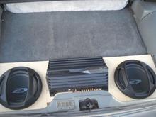 Two ten inch alpine subs with an 800 watt explode amp