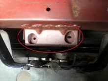 What is this? It's right behind the hood latch.