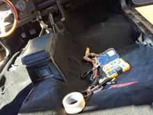 Laying down carpet in front.