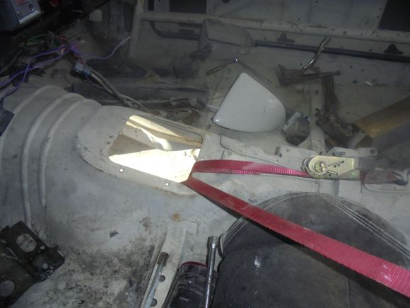 Had to use a ratchet strap to pull the torque arm back up into the tunnel before jacking the rear end back up.
