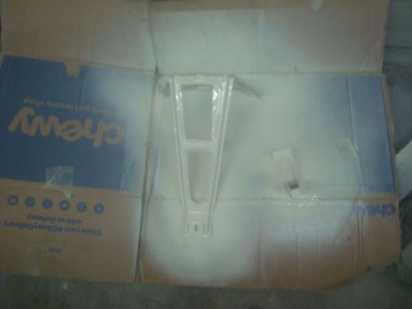 Hood latch support and safety catch.