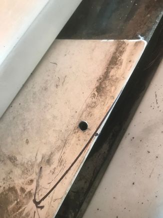 The new mounting hole is JUST far enough away from the glass.