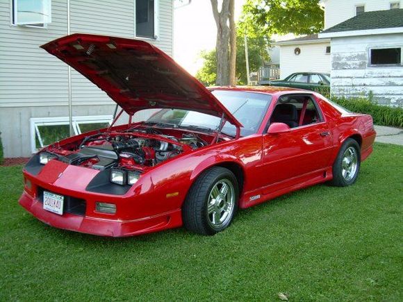 2008. Made the headlight housings black with matte rattle-can.