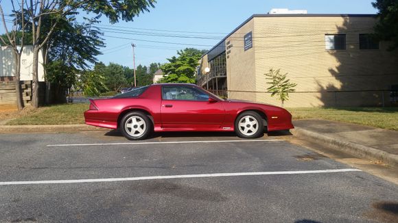 Greensboro, NC. This ones been in this parking spot for many years. It looks too good to be forgotten but I dont recall seeing it ever being out of this space. It has a sun visor thats fallen down. I think that dark red looks fabulous on our cars.