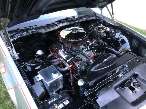 Fresh engine bay in gloss black with the 400 SBC