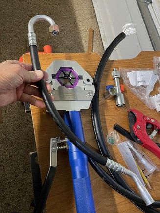 This Amazon, china hydraulic crimp tool got great reviews.  It was about $125 when I purchased it in the fall of 2023.  It did a great job on the Mustang and I plan to use it again on my next project car.