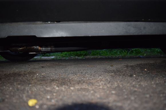 Side shot of exhaust. U can see the Asa's collectors in the left. They are the lowest part of the whole exhaust and everything tucked up higher than stock. This is with a driveshaft safety loop.