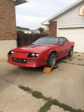 Up on stands waiting to drop the tank