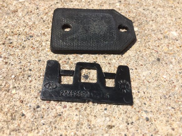 Top is rubber behind silver wedge. Note that the shim screw holes are closer together than the gasket holes.
