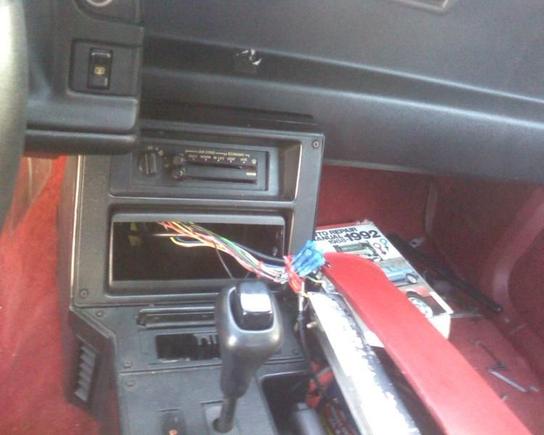 The radio was ripped out along with all of the speakers the wires were all chopped when i got the car