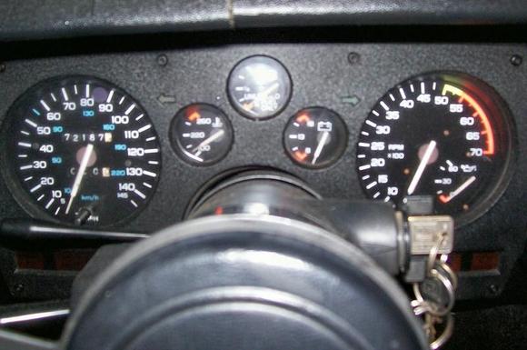 This is the irregular speedo cluster with 145mph and 5500 red line tach.