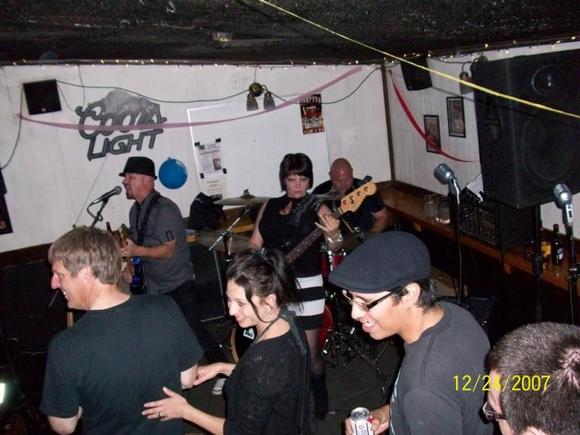 DIDNT GET THIS BANDS NAME BUT ANOTHER SCORCHING GIRL BASS PLAYER.