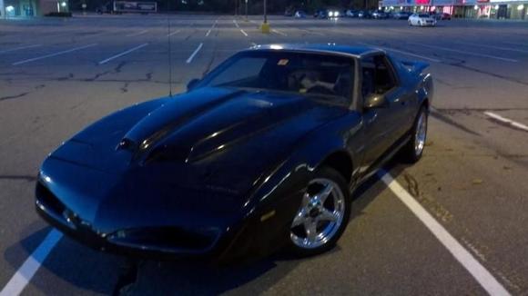 RAII hood, interior is front 4th gen leather, rears to be deleted with a back half 6 point cage, black/black color combo, driving it since Oct 11'