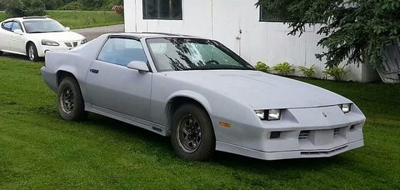 car was originally yellow white brown and red. This is the new color, just gray primer for now.