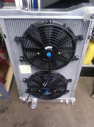 triple core aluminum radiator and electric fans.