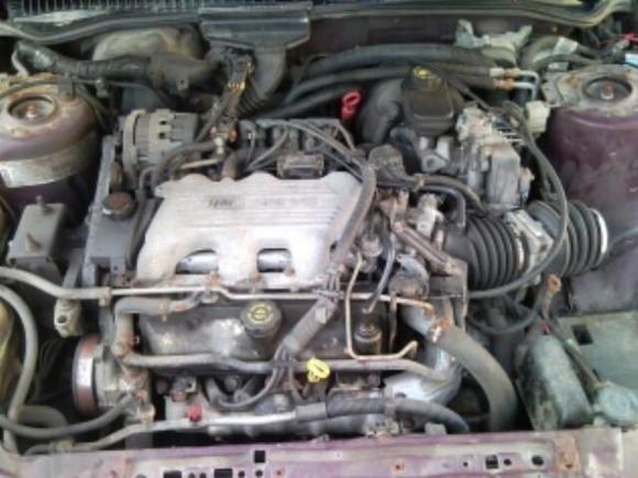 Possible 3100 top end swap components from car sitting in driveway