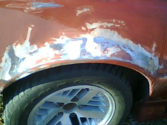 previous owners attemp at body work. RR Quarter is mangled.