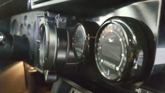 I have to take a new one. 2 Innovative gauges (oil temp &pressure, AFR) and a better rev gauge with shift light.