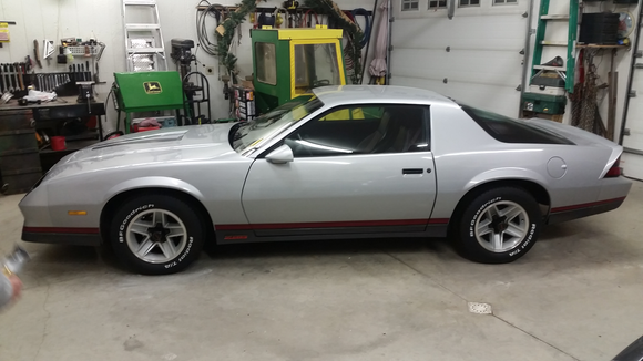 After new stripe kit (originals were peeling in a lot of places) and put new tires on. Original tires looked good, just dont trust 36 year old rubber. I kept them though. I'm pissed about the aftermarket stripes not matching the originals worth a damn, but can NOT find nos stripes in the dark red, light red, black combo