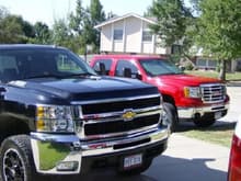 Cool picture of my truck and my dads 2009 GMC 2500