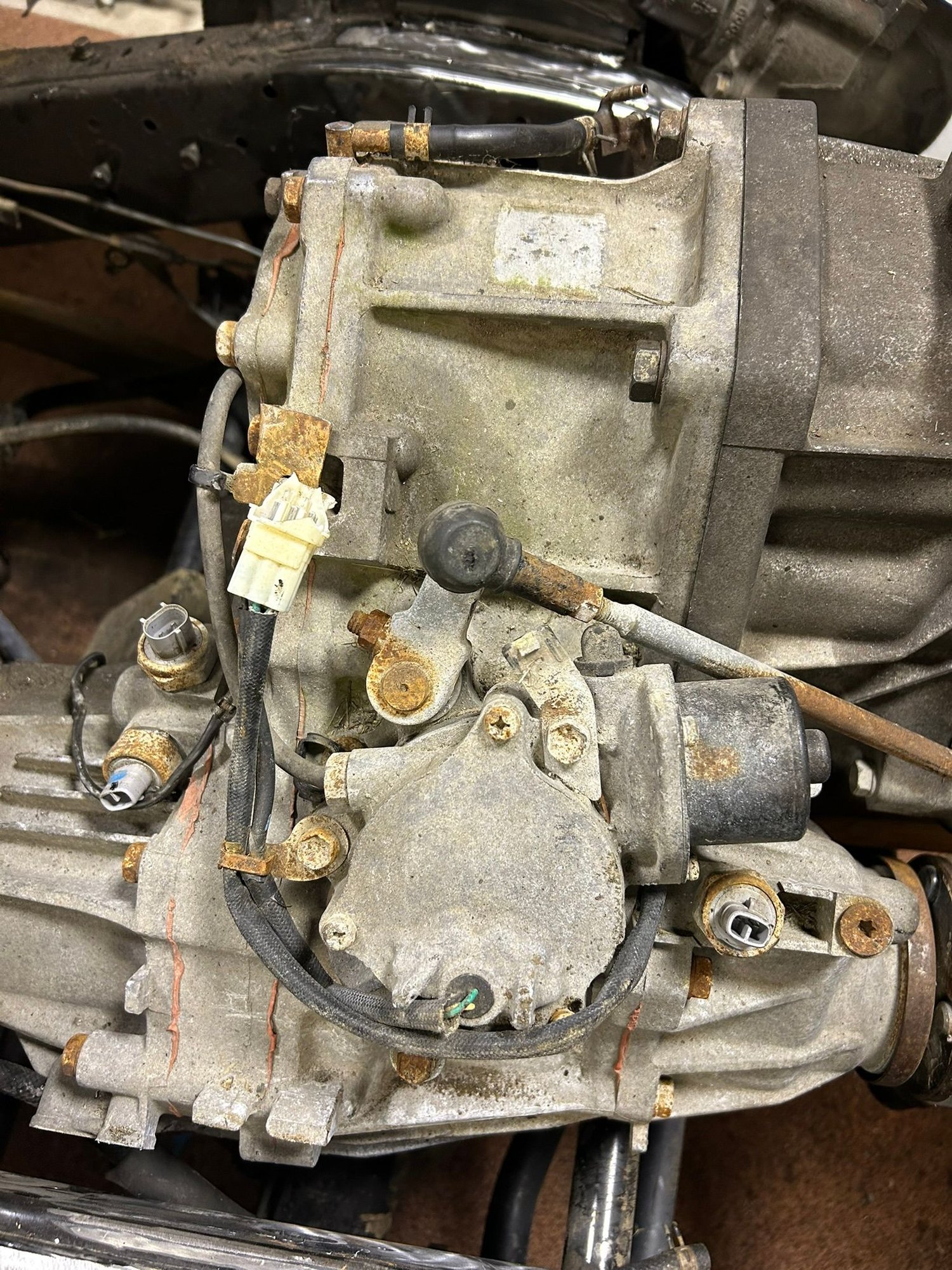Crushed the S out of the transfer case connector. Yay. Replacement on the way.