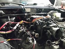 little teaser pic of the 5.3 ls in the the toyota with a painless wiring harness (still working it around to make it neat)